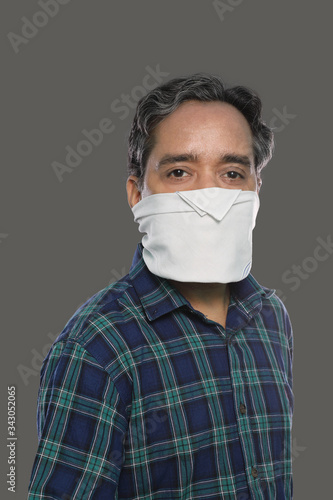Indian Man with Handkerchief Mask for Covid-19 / Coronavirus Prevention