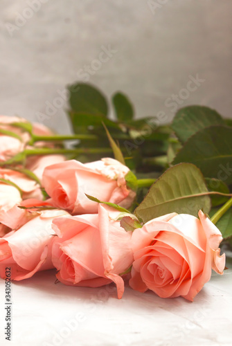 Vertical view of delicate pink roses