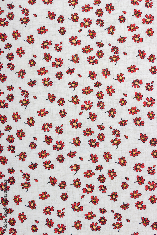 Beautiful calico texture with embroidered flowers on a calm plain background Beautiful calico texture with embroidered flowers on a calm plain background