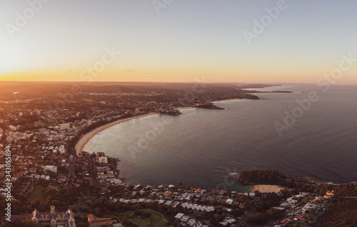 Panoramic aerial drone evening view of the Northern Beaches, a suburb of Sydney, New South Wales, Australia. Left to right: Manly, Freshwater, Curl Curl, Dee Why, Long Reef & Collaroy beaches.