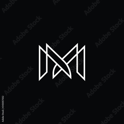 Minimal elegant monogram art logo. Outstanding professional trendy awesome artistic M MM MX XM initial based Alphabet icon logo. Premium Business logo White color on black background