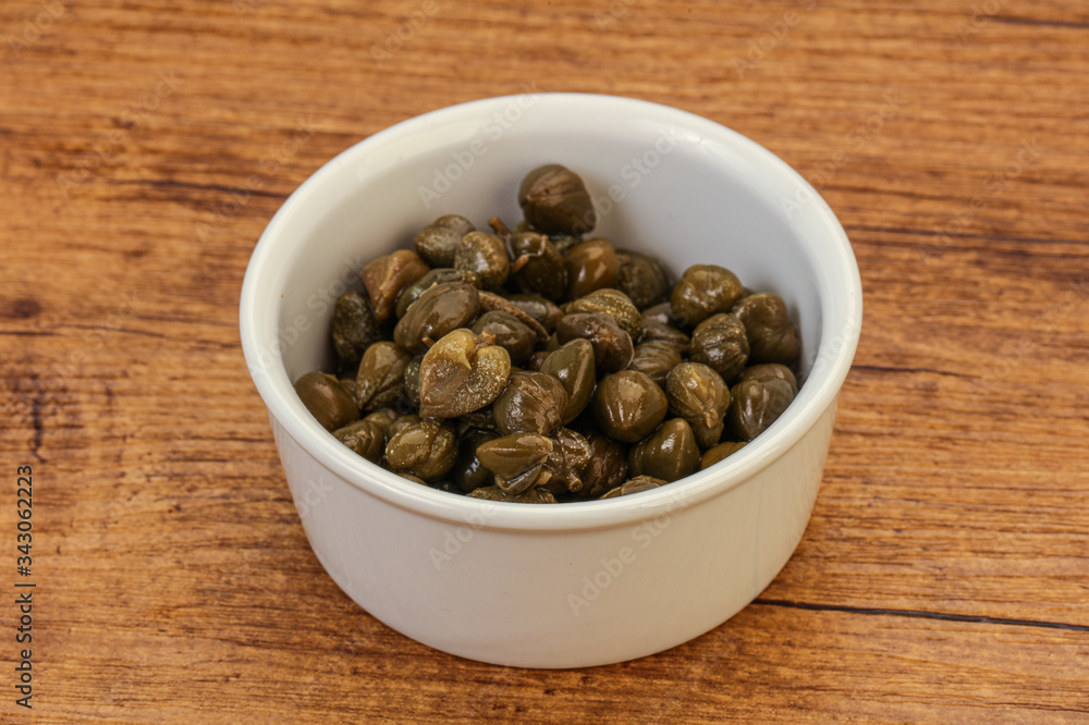 Tasty capers in the bowl Tasty capers in the bowl