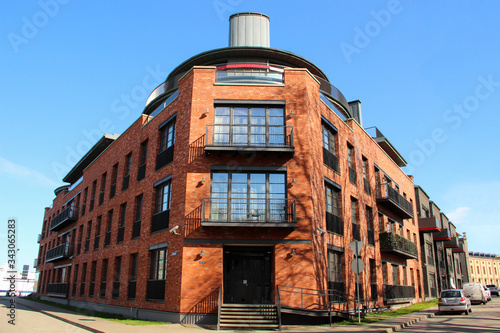 Obraz na plátně Modern apartments in the house built of red bricks