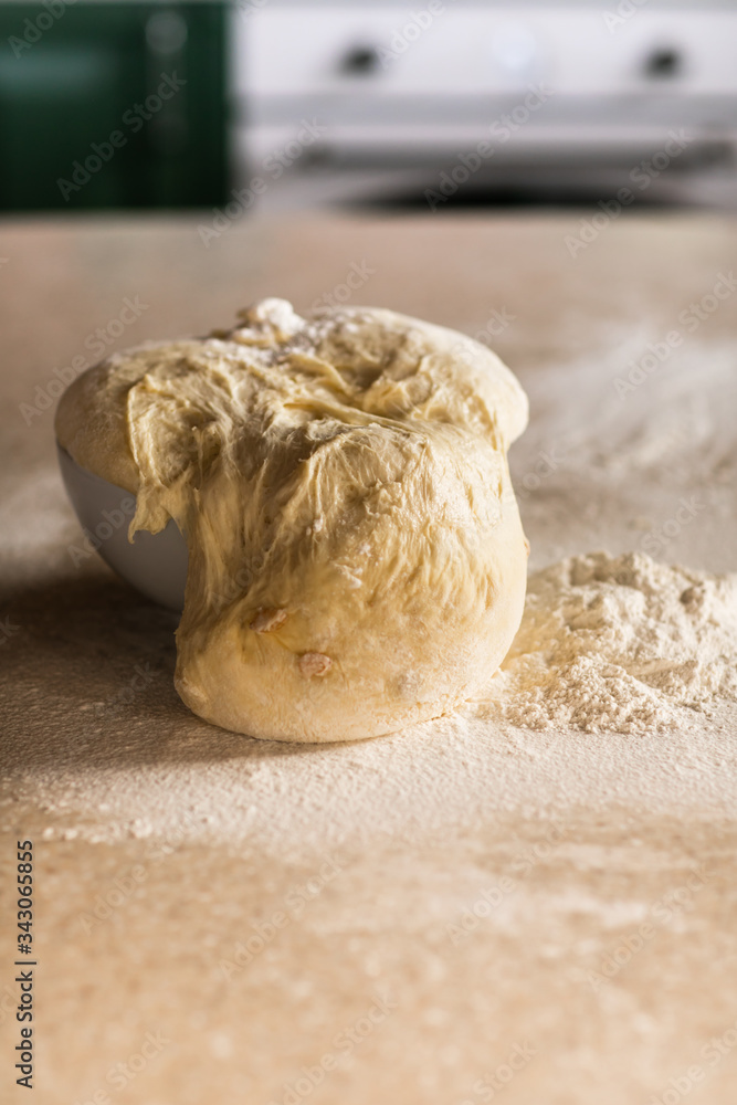 Fototapeta premium Fresh bread dough on white kitchen table