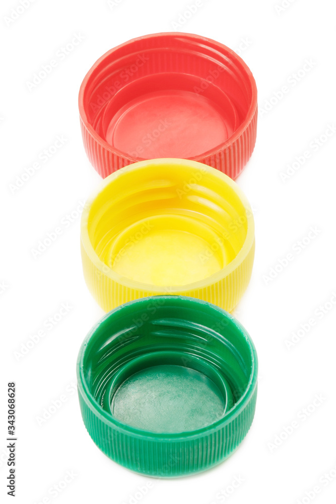 Colorful plastic bottle caps isolated on white background Colorful plastic bottle caps isolated on white background