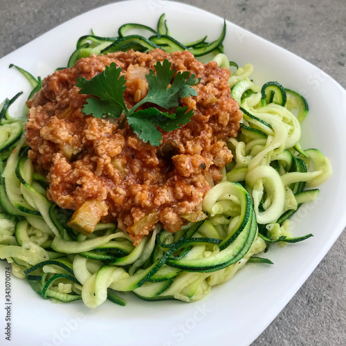 Zucchini pasta and vegan bolognese made with texturized soya