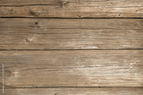 Old weathered wood surface. wooden background texture of wall of log rural house with copy space for your design. Blank template