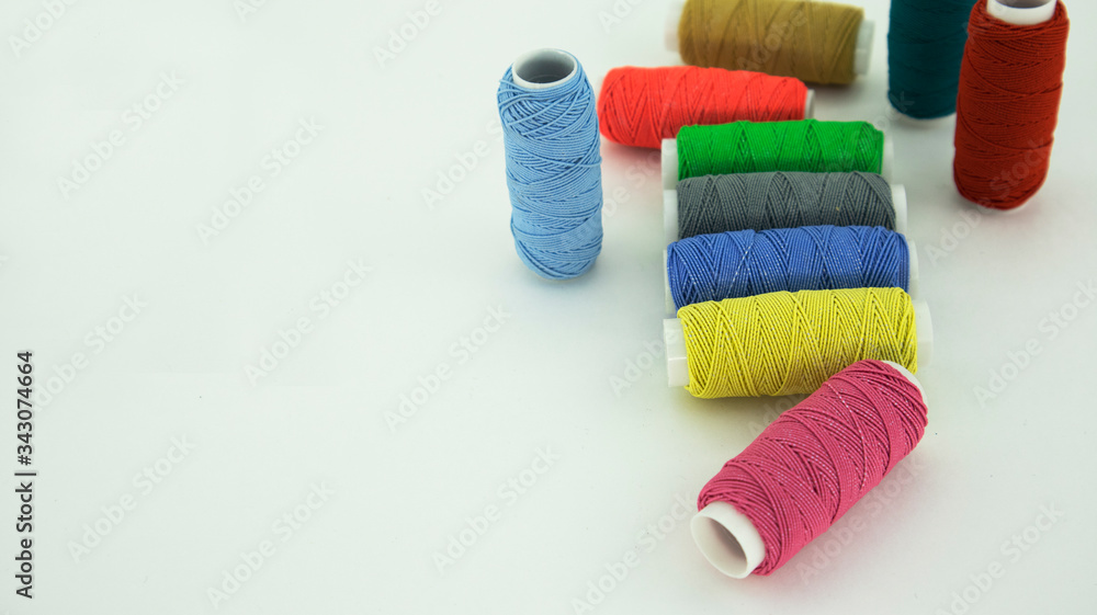 set of embroidery threads on a white background set of embroidery threads on a white background