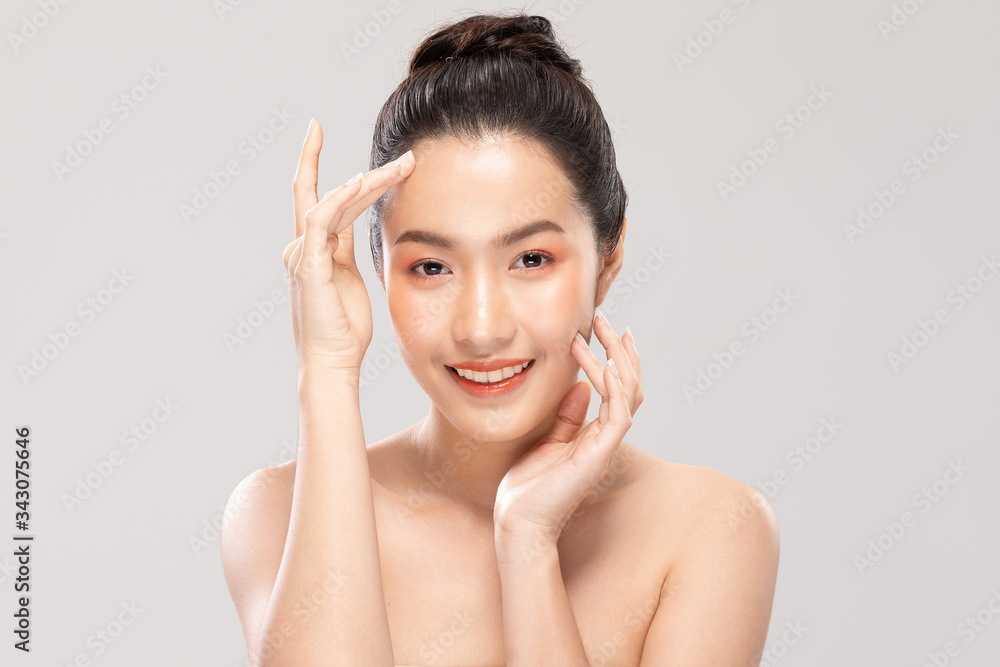 Beautiful Asian woman touching soft cheek smile with clean and fresh skin Happiness and cheerful with positive emotional,isolated on white background,Beauty and Cosmetics Concept Beautiful Asian woman touching soft cheek smile with clean and fresh skin Happiness and cheerful with positive emotional,isolated on white background,Beauty and Cosmetics Concept