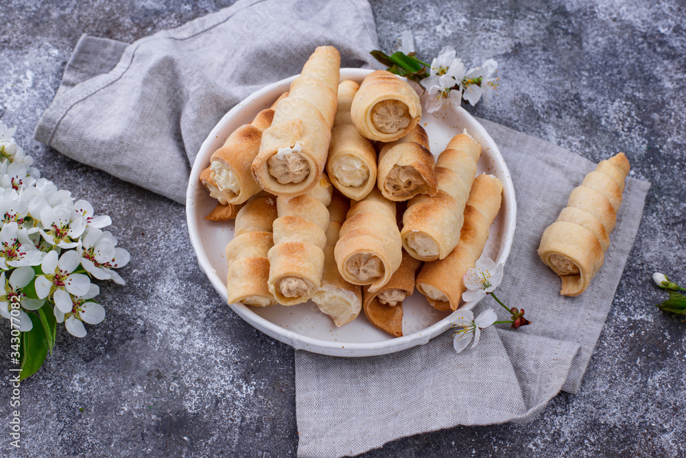 Sweet tubule or cones with cream Sweet tubule or cones with cream