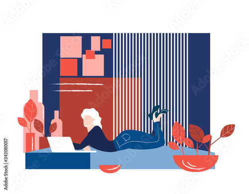 Freelancer. The girl lies and lazily does her job on a laptop