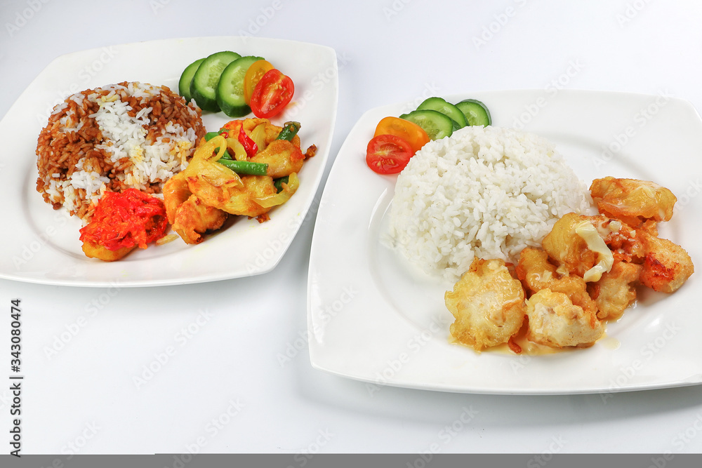Turmeric fried chicken ayam goreng kunyit black sauce rice and butter chicken rice Turmeric fried chicken ayam goreng kunyit black sauce rice and butter chicken rice