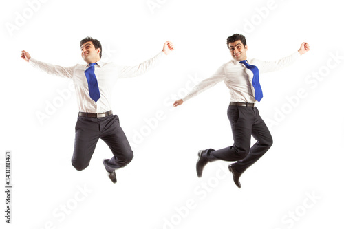 Two poses of Young office corporate man jumping high spreading his arms with joy wearing blue tie isolated on a white background