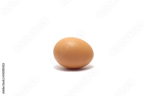A chicken egg isolated on white background