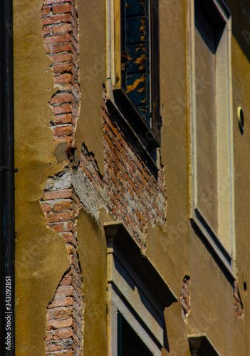 Venice, Italy - August 27 2019: Part o a building with brick walls