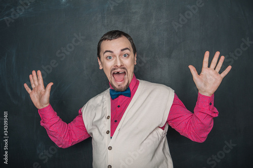 Surprised Funny thick teacher or business man on blackboard