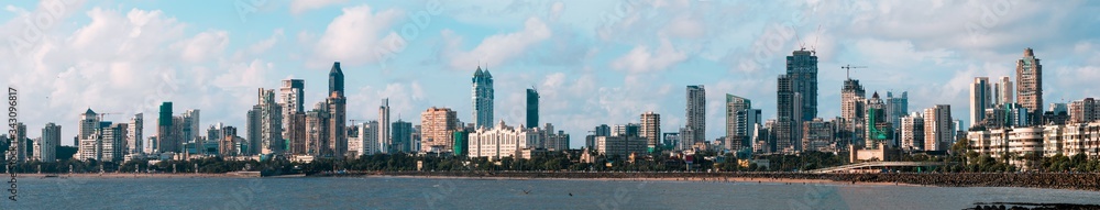 A panorama of the skyline as seen from Marine Drive, South Mumbai. The panorama begins with Kemps Corner and ends at where the Art Deco buildings start. 