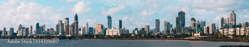 A panorama of the skyline as seen from Marine Drive, South Mumbai. The panorama begins with Kemps Corner and ends at where the Art Deco buildings start.  photo