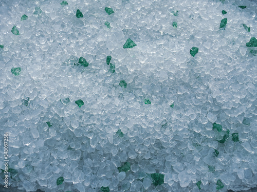Silica gel, cat tray filler. blue and green translucent crystals texture
