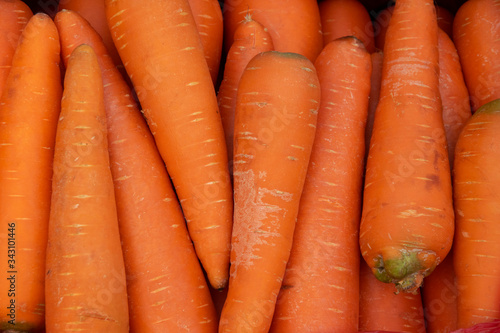 Organic fresh carrot in the market, vegetable background concept.