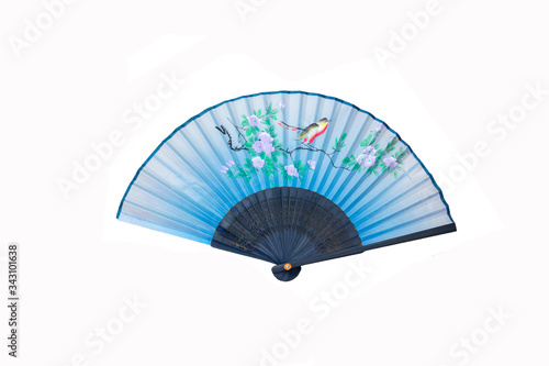 Blue hand fan with birds and flowers isolated on white