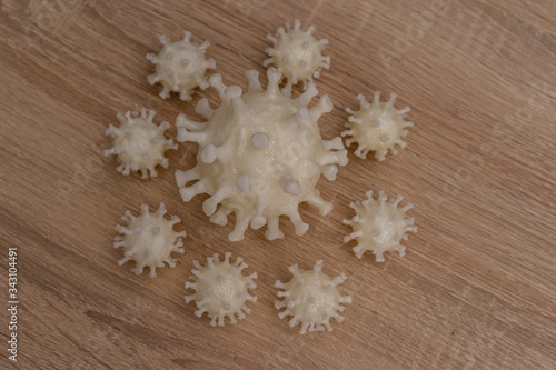 Wallpaper Mural covid19, 3d printed representation of the virus on a wooden surface. home security and protection against viruses Torontodigital.ca