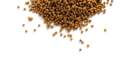 Above or Top view of animal food. Brown Dried dog food on white background. Grain pet food banner background with copy space for text design.