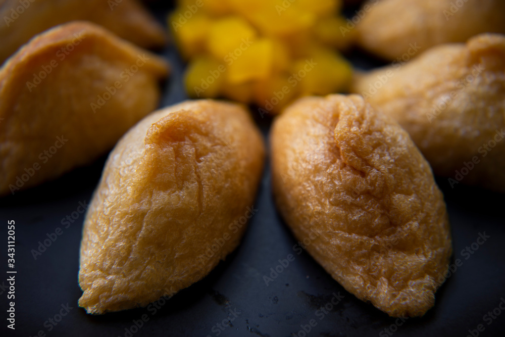 Korean style inari sushi which is fried tofu stuffed with rice Korean style inari sushi which is fried tofu stuffed with rice