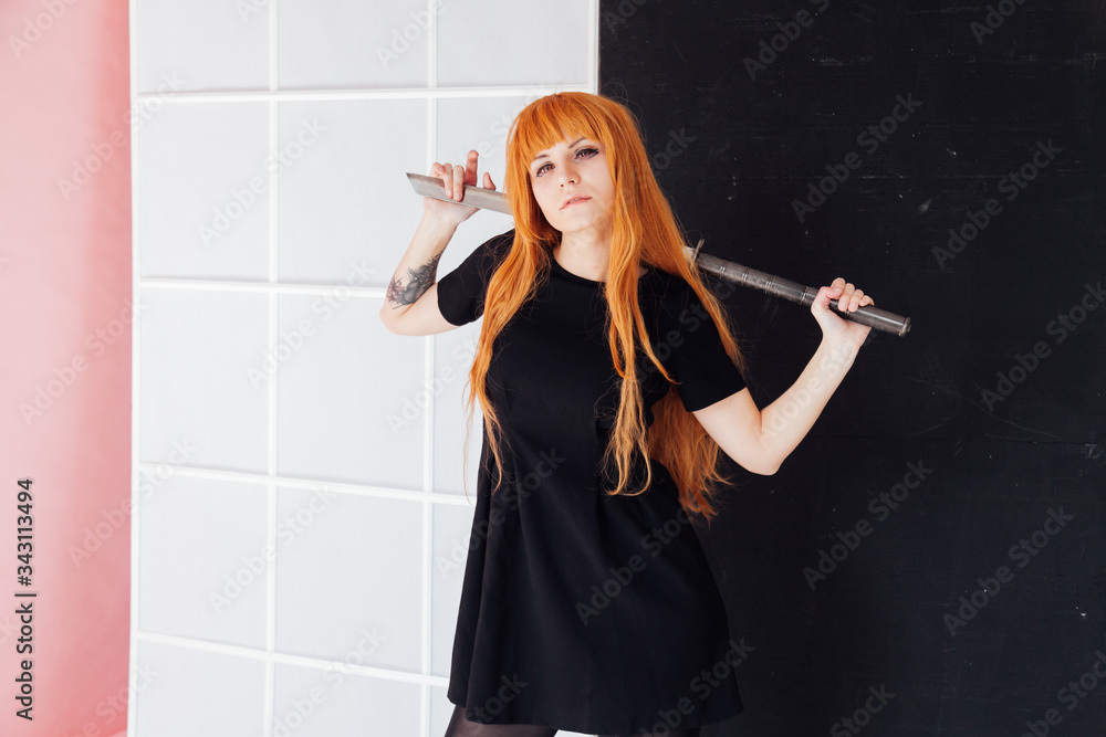 woman anime cosplayer with red hair Japanese sword woman anime cosplayer with red hair Japanese sword