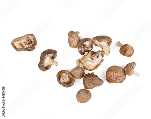 dried shiitake mushrooms on white background.top view