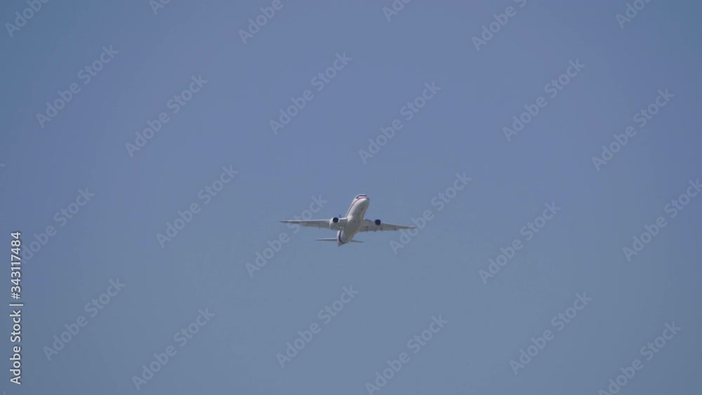 Commercial passenger airplane Sukhoi Superjet 100 flying demonstration flight of the international aerospace salon MAKS-2019. Commercial passenger airplane Sukhoi Superjet 100 flying demonstration flight of the international aerospace salon MAKS-2019.