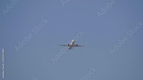 Commercial passenger airplane Sukhoi Superjet 100 flying demonstration flight of the international aerospace salon MAKS-2019.