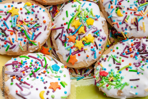 texture, background, baking cream dessert sweet, happy easter. glaze. multi-colored topping, cookies on a plate