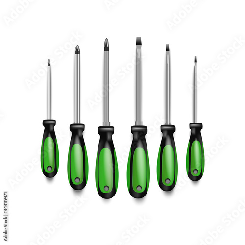 Screwdriver set with rubber black and green handles. different size screwdrivers for removing screws. Tool for drivers, builders and craftsmen isolated on white background. 
