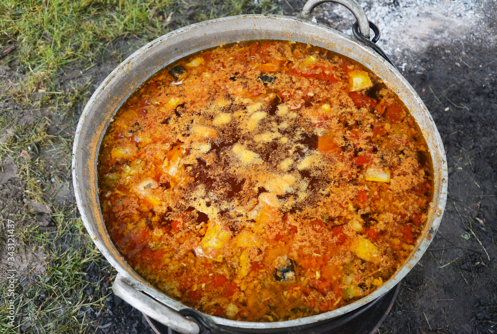 food prepared in a cauldron