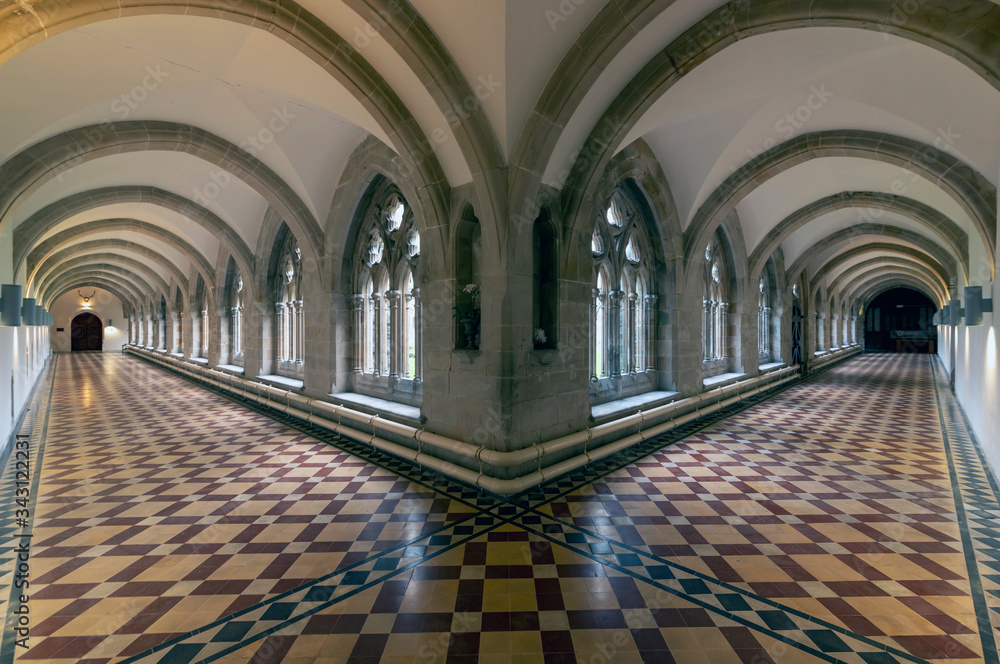 corridors of stone repeat patterns in an abbey corridors of stone repeat patterns in an abbey