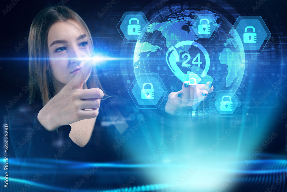 Business, Technology, Internet and network concept. Young businessman working on a virtual screen of the future and sees the inscription: Business, Technology, Internet and network concept. Young businessman working on a virtual screen of the future and sees the inscription: