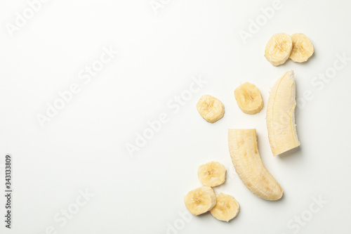 Bananas on white background, top view. Fresh fruit