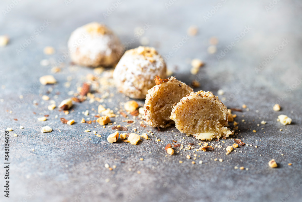 Vegan dessert, raw oatmeal nuts fruit bites prepared with natural ingredients.