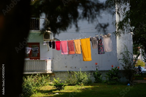 washed clothes hanging on ropes between houses in Batumi Georgia