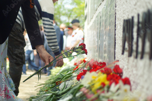 Laying flowers on the 9th of May for veterans