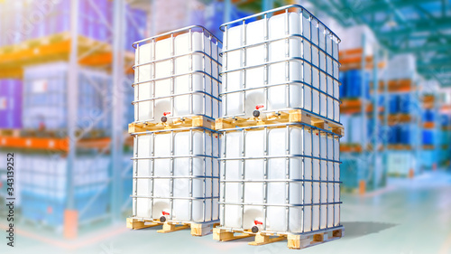 Large liquid tanks in stock. Warehouse of chemical products. Concept - white tanks are designed to store reagents. Chemical industry. Concept - warehouse of a chemical factory. Petroleum.