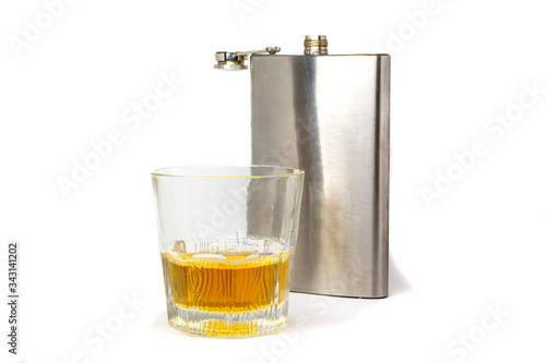 flask and glass tumbler isolated on a white