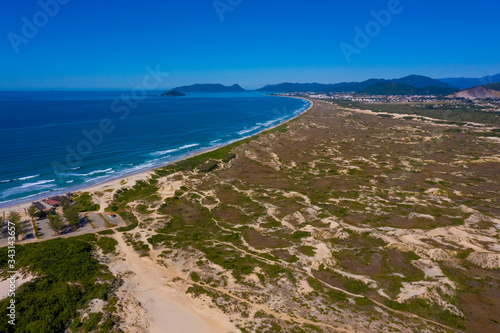 Aerial footage over Joaquina beach in Florianopolis, Santa Catarina, Brazil