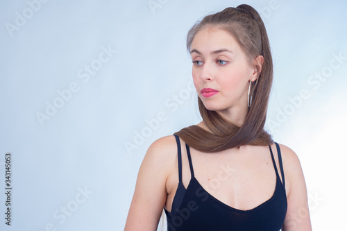 A young girl with long hair...
