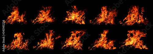 The set of 4 thermal energy flames image set on a black background. Yellow red heat energy