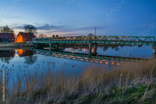 Wallpaper Mural bridge and river, beautiful landscape after sunset, Poland Torontodigital.ca
