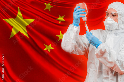 Microbiologist in a protect...