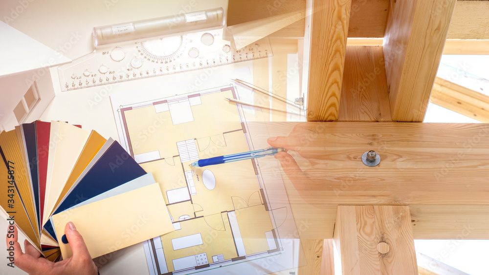 An interior designer makes a project of a wooden house. Interior ...