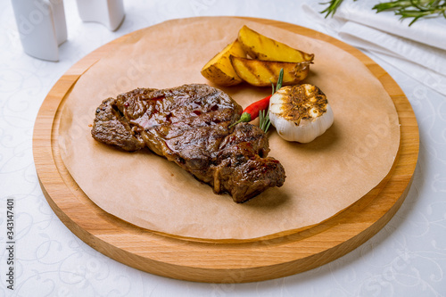 juicy Ribeye steak on white table